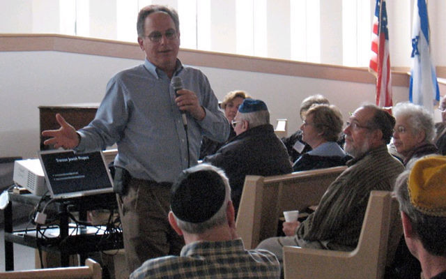 Ed Alpern tells the more than 60 people gathered March 13 at Adath Israel Congregation about the Trenton Jewish Project.