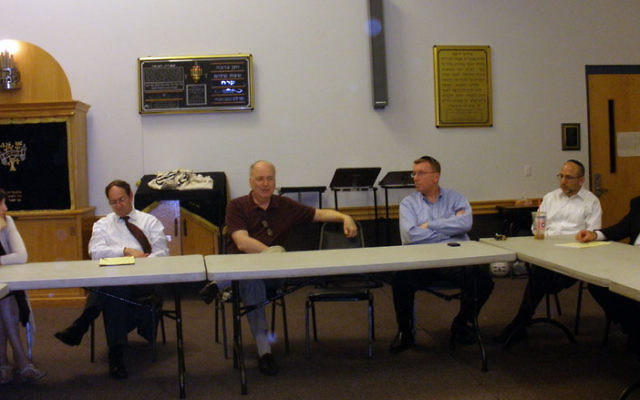 Committee members explore the creation of a high school division of Rabbi Pesach Raymon Yeshiva at its first meeting July 20 at the Edison school. Photo by Debra Rubin
