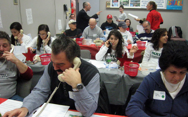 Volunteers make phone calls at last year’s Super Sunday phonathon of the Jewish Federation of Greater Middlesex County. Photo courtesy Jewish Federation of Greater Middlesex County