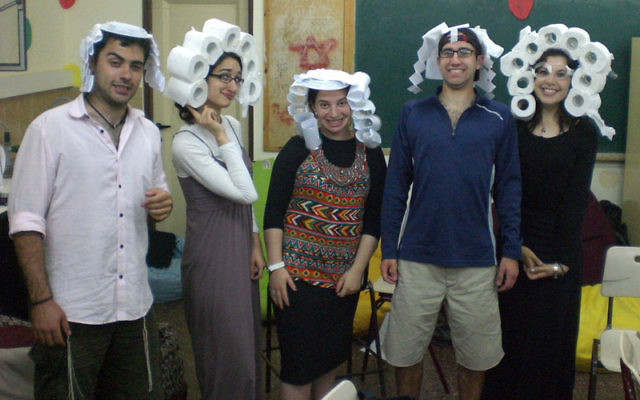 On a roll: Avital Chizhik, far right, joins other counselors to entertain campers at the YU Counterpoint Israel program in Arad.