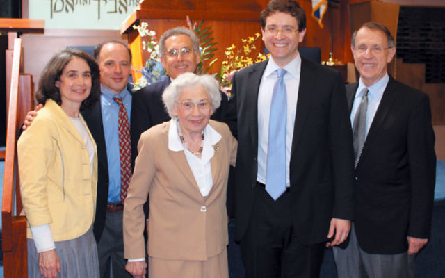 Commemorating the 25th anniversary of the Israel Segal Memorial Lecture at Neve Shalom in Metuchen are, his widow, Shirley, front, and from left, children Deena Segal Fraint, Danny Segal, and Eric Segal; speaker Dr. Julian Zelizer; and Rabbi Gerald Zeli