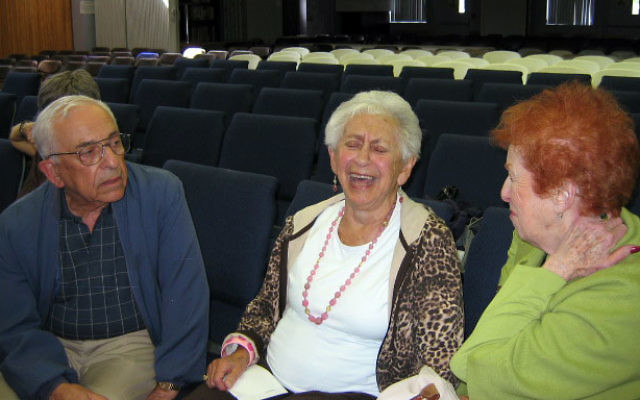 Former Weequahic High School English teacher Hilda Lutzke, center, exchanges fond remembrances with former Newark residents following the Sept. 13 meeting of the Jewish Historical Society of Central Jersey at Congregation Etz Chaim Monroe Township Jewis