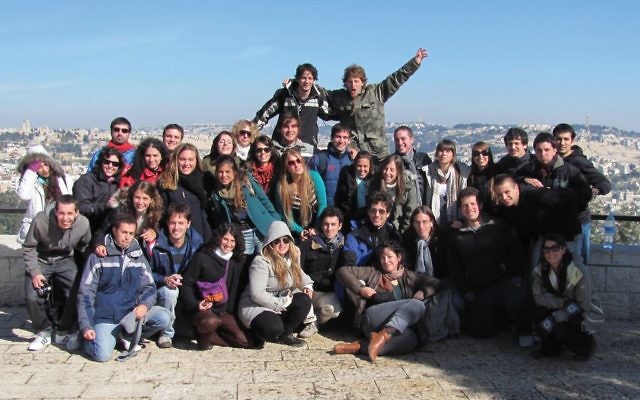 A group of Birthright participants pose during their trip to Israel. Wikimedia Commons
