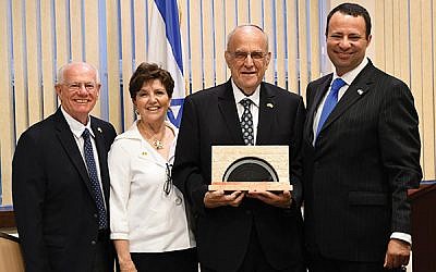 Gordon Haas, second from right, displays his Recognition Award as immediate past president of the State Association; with him are, from left, executive director Jacob Toporek and president Marlene Herman, and Dov Ben-Shimon, executive vice president/CEO, Jewish Federation of Greater MetroWest NJ.