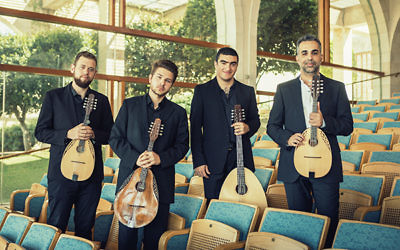 Jacob Reuven, right, and the Be’er Sheva Mandolin Quartet will be performing its program of classical, Israeli folk, and American melodies at the Monroe Senior Center on July 31. Others shown, from left, are Roi Dayan, Deniss Garejevf, and Dor Amran.