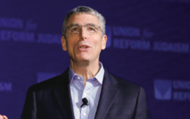 Rabbi Rick Jacobs speaking at the 2015 Reform biennial in Orlando: “I can distinguish between being upset at the government and being in touch with the people and with Jewish ideals.” URJ