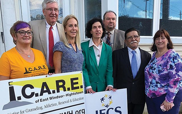 At the Sept. 26 ribbon cutting are, from left, Rachelle StPhard, I.C.A.R.E. vice president; David Coates, I.C.A.R.E. president; Michelle Napell, JFCS executive director; East Windsor Mayor Janice Mironov; East Windsor Regional School District Acting Superintendent Michael Dzwonar; Hightstown Mayor Larry Quattrone; and Marygrace Billek, director, Mercer County Department of Human Service.