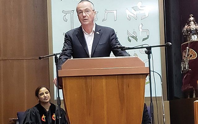 Gov. Phil Murphy, pictured, and Rep. Frank Pallone were among the officials speaking on Oct. 28 at an interfaith vigil that drew more than 600 people to Congregation Neve Shalom, Metuchen.