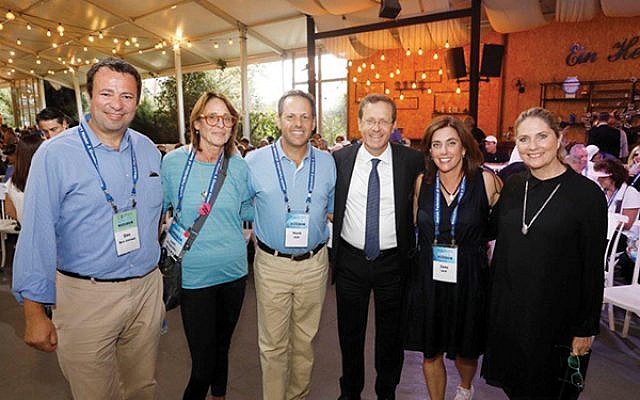 At Ein Hemed National Park are, from left, Dov Ben-Shimon, Lori Klinghoffer, Mark Wilf, Isaac Herzog, Jane Wilf, and Michal Herzog. Photos courtesy Jewish Federation of Greater MetroWest NJ