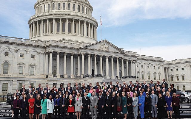New House members, posing last week at the Capitol, are younger and more diverse than previous congressional classes. Israel could be in the crosshairs. GETTY IMAGES