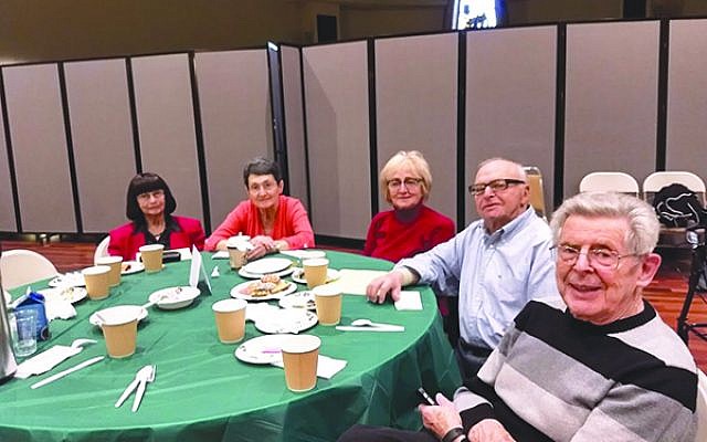 Holocaust survivors at Café Europa, a monthly Jewish Family Services of Middlesex County program providing socialization and entertainment. 
Photos by Debra Rubin
