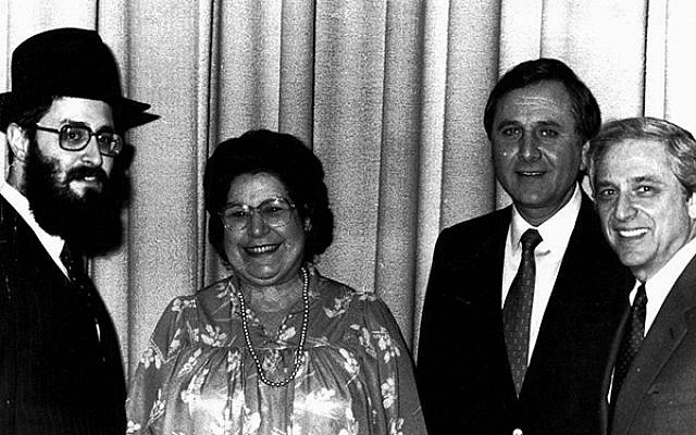 Rutgers Chabad executive director Rabbi Yosef Carlebach, left, greets, from left, Pauline Chadowitz, Jeffries Shein, and then-Rutgers president Dr. Edward Bloustein in 1980. (Photo courtesy Rutgers Chabad)