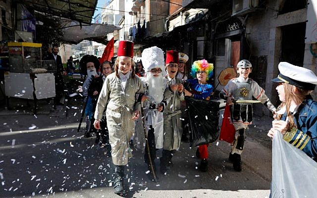 Celebrating the lead up to Purim in the Mea Shearim neighborhood of Jerusalem on March 19, 2019. Getty Images