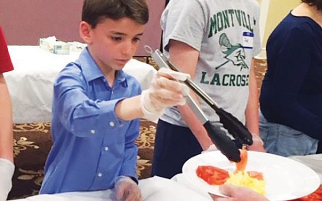 Pine Brook Jewish Center volunteers included Jake Wise and Jack Tlusty. 
Courtesy PBJC