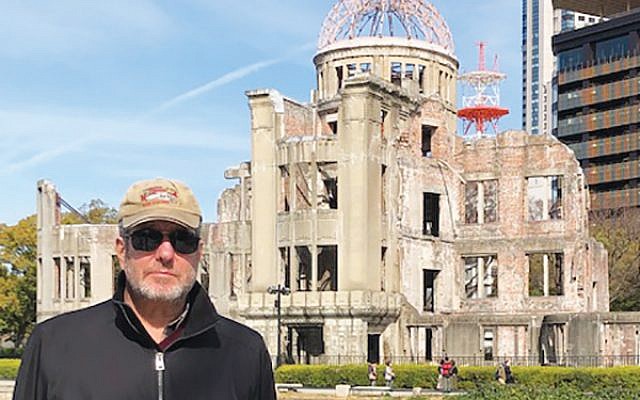 The author in front of the A-Bomb Dome in 
Hiroshima. Photo Courtesy Martin Raffel