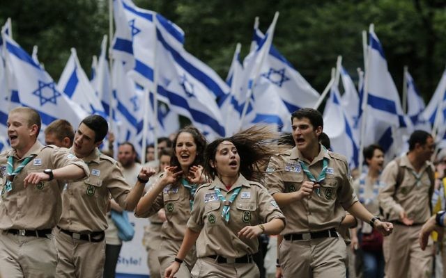 People march the annual Celebrate Israel Parade on June 3, 2018 in New York City. The parade marked the 70th anniversary of the founding of Israel. Getty Images