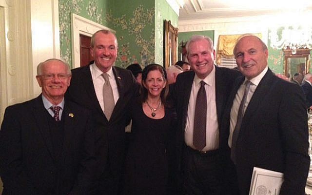 The NJ State Association of Jewish Federations with executive director Jacob Toporek, at left, will be dissolved at the end of June and replaced by the new Jewish Federations of New Jersey. Also pictured are Gov. Phil Murphy, Tammy Murphy, Steve Klinghoffer, and Roy Tanzman. 
Courtesy State Association