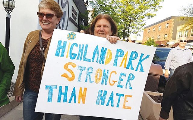 Marilyn Pruce, right, and Susan Slusky were among the 100 people marching through Highland Park to Rutgers Chabad. Photo by Debra Rubin