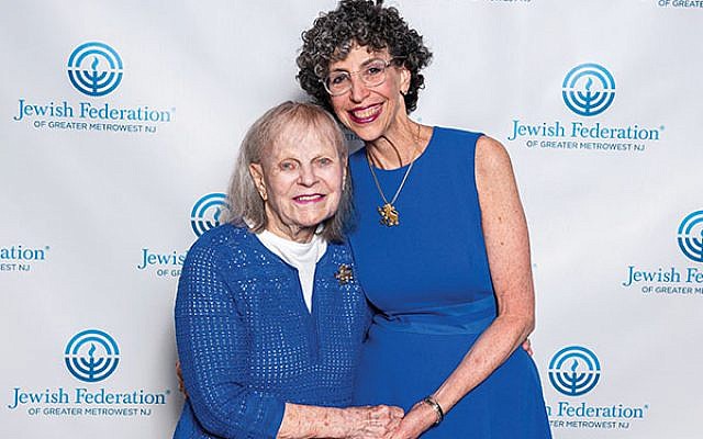 Rita Waldor, at left, with Jody Hurwitz Caplan, president of Women’s Philanthropy, at the annual meeting in April when Waldor was presented with the President’s Bamberger Award.