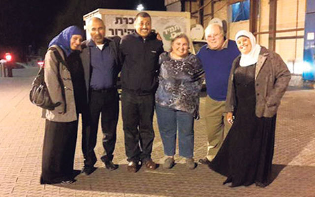 Israeli Arab Committee cochair Phyllis Bernstein, center, and Bob Kuchner, chair of the Greater MetroWest federation’s Israel and Overseas Committee, second from right, visit with Bedouin educators in Jaffa last February.    