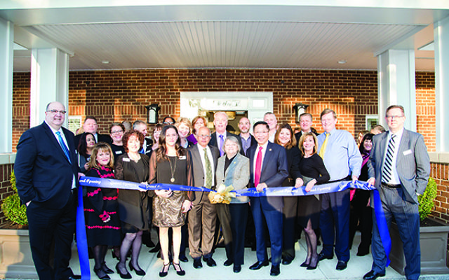Officials at the ribbon-cutting ceremony and VIP open house event on Jan. 18.