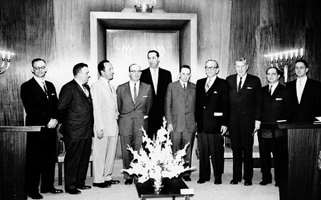 B’nai Or leaders gather on the bima for the dedication in 1958 of the temple’s original building on South Street, built on land donated by former Morristown Mayor W. Parsons Todd, fifth from right.