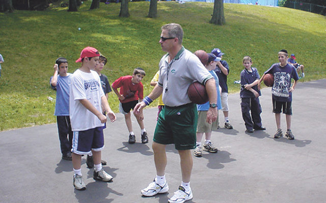 Playing basketball at a downsized Gan Izzy last year.