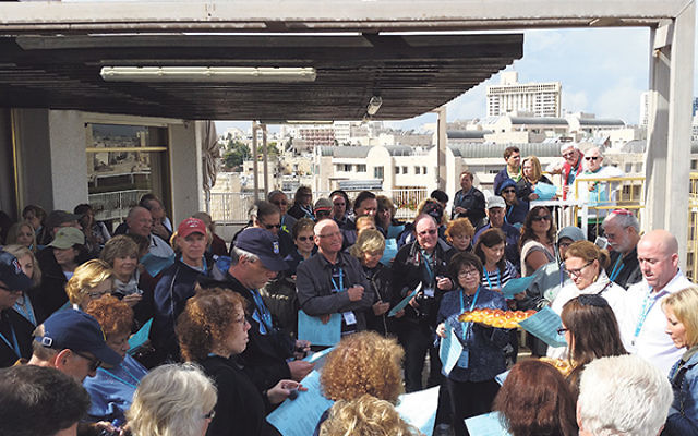 Keith Krivitzky, far right, welcomes members of the federations’ mission to a ceremony overlooking the Old City of Jerusalem.