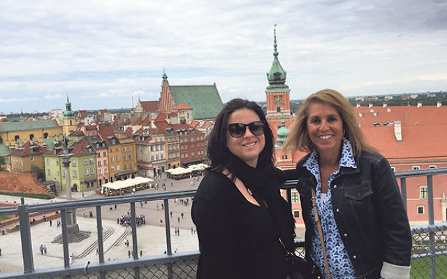 Educators Melissa Weiner, left, and Judy Rosen in a spot overlooking Old Town in Warsaw.&nbsp;