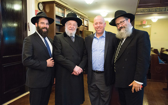 Former chief Ashkenazi rabbi of Israel, Yisrael Meir Lau, second from left, is flanked by executive director of Chabad of the Shore Rabbi Laibel Schapiro, at left, Jewish Federation CEO Keith Krivitzky, and Rutgers Chabad executive director Rabbi Yosef Ca