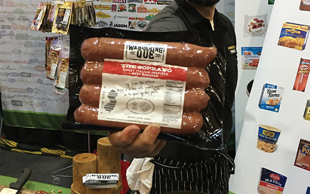 Ari White, owner of Wandering Que, shows off his newly launched kosher sausages at Kosherfest 2017 held in Secaucus in November. Photos by Johanna Ginsberg 