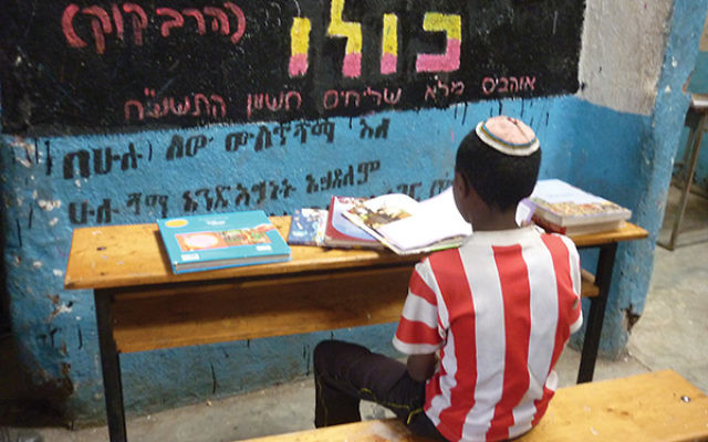 A child studying at the Jewish Community Center in Gondar. Photo By Miriam Seiden