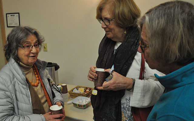 Ecuadorian native Anna Rosa Kohn of Princeton, left, speaks with attendees at the screening of An Unknown Country, Glenda Mendelsohn of Yardley (center) and Janet Moshe of Jerusalem.