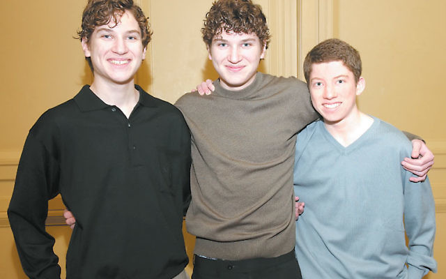 The Krieger sons, from left, Daniel, Eric, and Josh at a recent UJC MetroWest fund-raising event