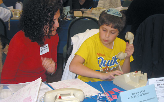Volunteers of all ages made phone calls at last year’s Super Sunday. Photo by Johanna Ginsberg Volunteers of all ages made phone calls at last year’s Super Sunday. Photo by Johanna Ginsberg