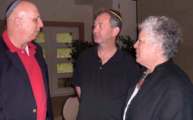 Hillel Zaremba, left, at Adath Israel May 15, with Jonathan Miller, congregation vice-president and cochair of the Israel Festival, and Hedda Morton, director of congregational learning.