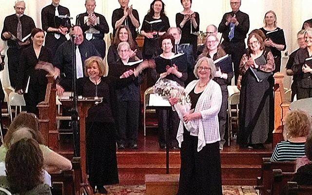 Sharim v’Sharot, here at the Songs of Peace: Shalom-Salaam Concert in Ewing last May; the group’s director and conductor Dr. Elayne Robinson Grossman, holding flowers, said the plethora of Jewish choral group’s is “a positive sign for Jewish culture and community.”. Photo Photo courtesy Elayne Robinson Grossman