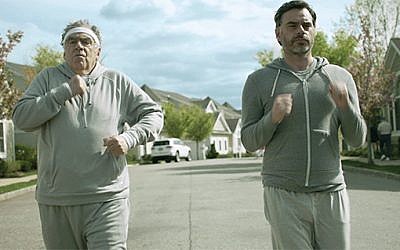 Father and son — Bob (Elliott Gould) and Nate (Jemaine Clement) — power walk through Cranberry Bog, an “adult lifestyle community” in New Jersey.
