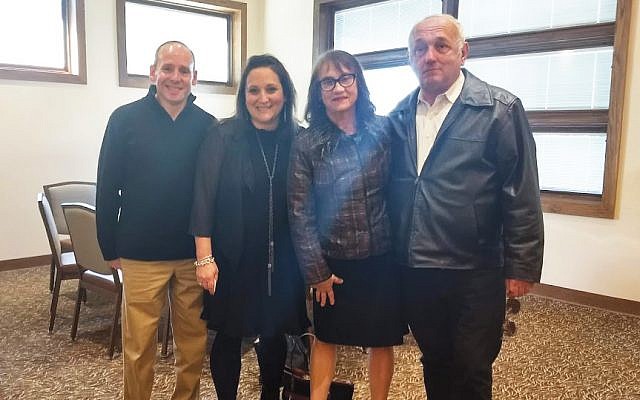 At a brunch at Rutgers Hillel memorializing Ezra Schwartz are, from left, his parents, Ari and Ruth Schwartz, and his grandparents, Laurie and Alan 
Senecal. Photos by Debra Rubin