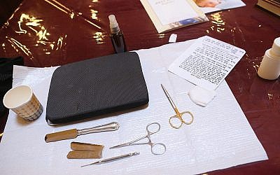 Bris instruments lie on a table ready to be used at a circumcision ceremony in Germany. Getty Images