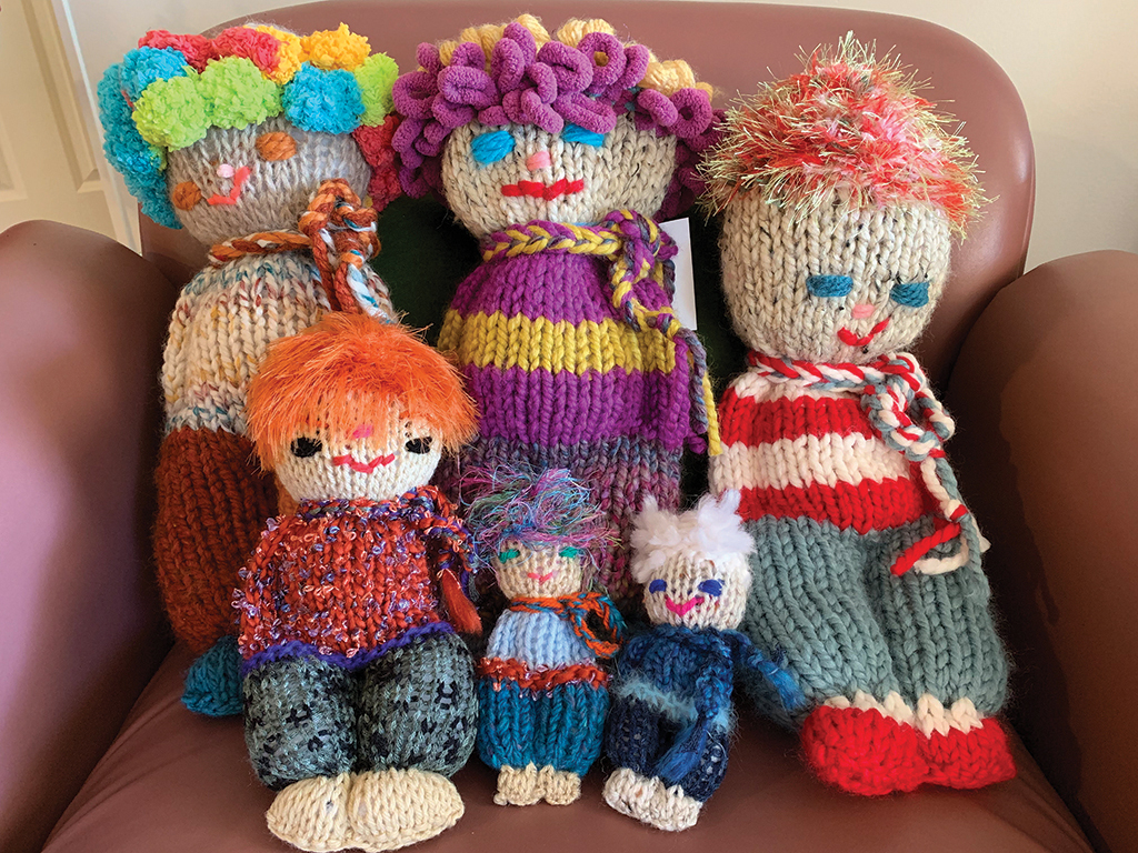 first knitter knitting doll