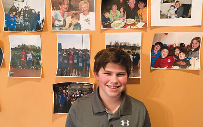 Jake Green held his bar mitzvah service at home with 150 guests in attendance on Zoom. Photos of family members decorated the walls of the Greens’ home in Newtown, Pa. Photo Courtesy Green family
