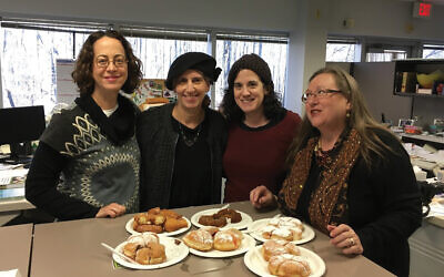 NJJN staffers taste test varieties of sufganiyot, jelly donuts, and Moroccan treats for Chanukah.