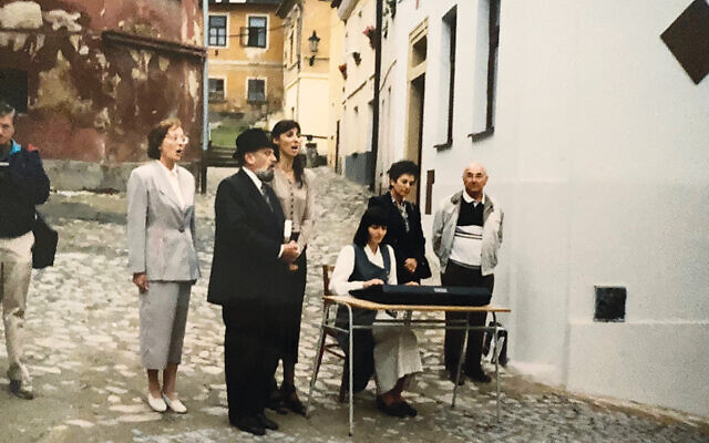 The cantor and soloist from Brno’s synagogue sing at the ceremony. Mr. Ticho stands at the far right.her on left side. The cantor and soloist from Brno’s synagogue sing at the ceremony. Mr. Ticho stands at the far right.her on left side.