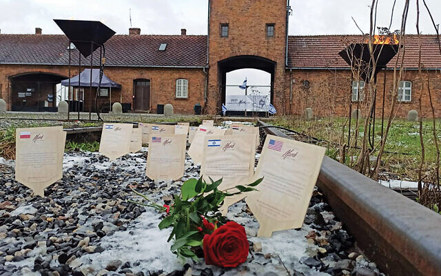 Virtual plaques on the Auschwitz-Birkenau train tracks