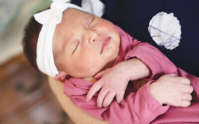 This is the newborn Amalya Shachar, daughter of Rabbi Simeon Cohen and Dr. Ariel Fein.
