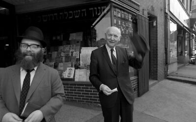 Author Isaac Bashevis Singer poses for a portrait outside the S. Rabinowitz Hebrew Book Store on New York's Lower East Side in 1968. (David Attie/Getty Images)