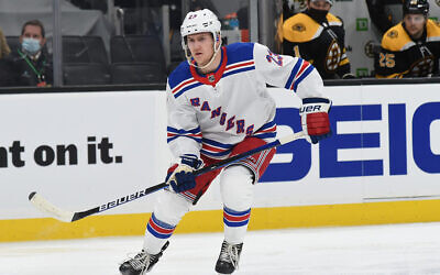 Adam Fox skates in a game against the Boston Bruins at the TD Garden in Boston, May 8, 2021. (Steve Babineau/NHLI via Getty Images)