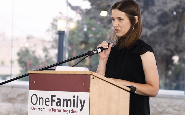 Sarah Nachenberg Shalev, the daughter of a woman still in a coma after the Sbarro bombing in 2001, speaks at the 20th memorial of the attack. (Meir Pawlowski)