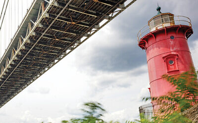 This view of the little red lighthouse from below the great gray George Washington Bridge is by Chaim Tzvi Schneider. See more of his work at chayimtzvi.myportfolio.com.